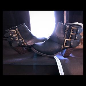 Black booties with buckle
